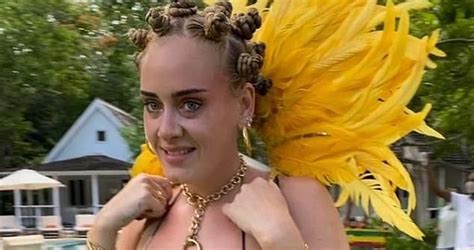 adele accused of cultural appropriation for wearing a jamaican flag bikini bantu knots