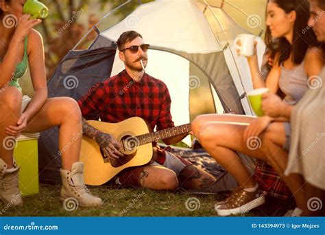 hipster man camping with friends stock image image of female friends 143394973
