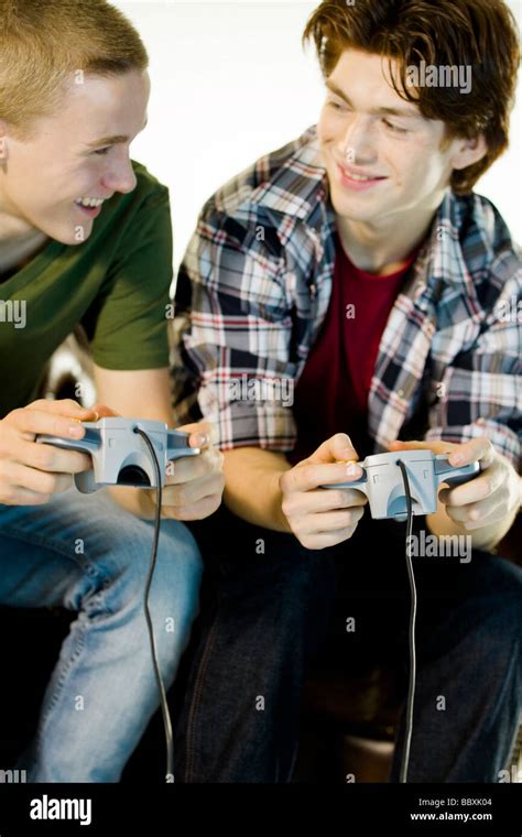 Two Teenagers Playing A Video Game Stock Photo Alamy