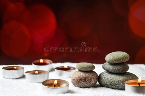 zen concept spa pebbles stones and burning aroma candles treatment aromatherapy and massage