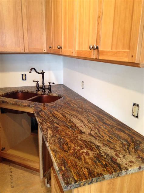 In fact, people have to choose the countertop that boosts up the value of your home. Progress. Cinderella gold granite | Kitchen decor themes ...