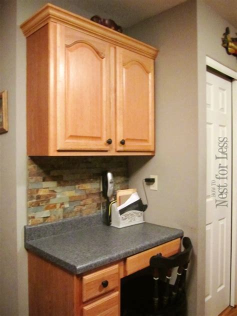 Matching the molding details when cabinets meet the ceiling. Mini Makeover: Crown Molding on My Kitchen Cabinets - How ...