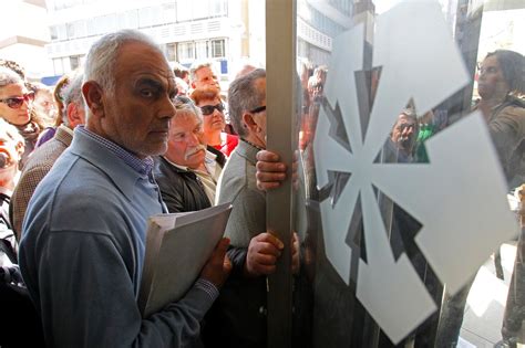 Cyprus Citizens Anxious As Banks Reopen With Limits The Washington Post