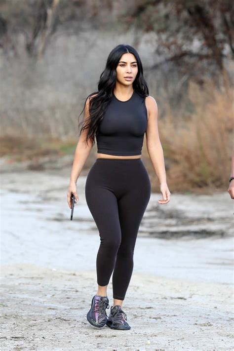 Kim Kardashian Sports A Black Crop Top And Leggings As She Steps Out