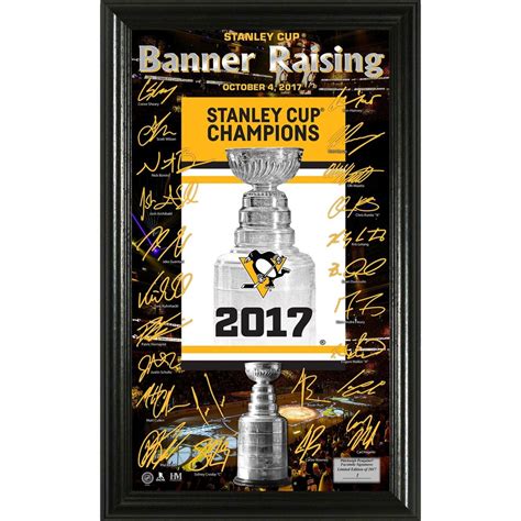 The Stanley Cup Trophy Framed In A Black Frame With Autographs On It