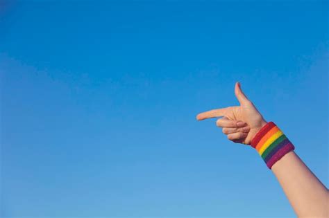 Premium Photo Gay Pride Concept Pointing Hand With Gay Pride Lgbt