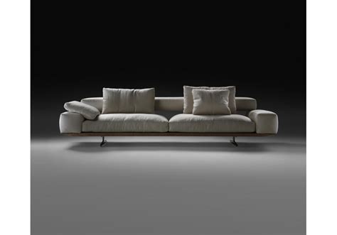 The dark gray sectional sofa is a minimalist's dream piece. Soft Dream Flexform Sofa - Milia Shop