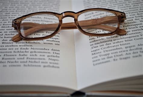 glasses a book pages free photo on pixabay pixabay