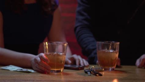 Young Woman Leaves Her Drink Unattended And Gets Drugged On A Date Stock Footage Video 3859355