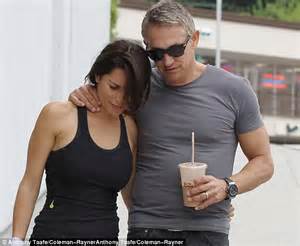 Danielle Lineker Is Met By Husband Gary Who Puts His Arm Around Her And