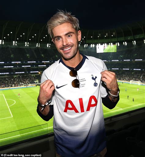Zac Efron Delights Football Fans As He Models A Spurs Shirt And Cheers