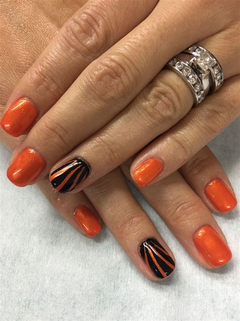 10 Stiletto Nails With Halloween Designs In Orange And Black Nail