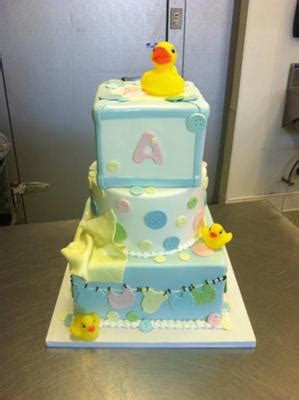 The top tier features a 3d duck holding a fondant umbrella! Duck Baby Shower Cakes And Diaper Cakes You Must See