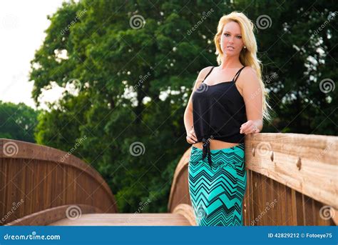 Blonde Fashion Model On A Bridge Stock Photo Image Of Flirty Flirt
