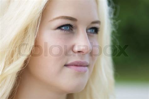 blond girl outdoor portrait stock image colourbox