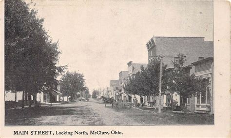 E41 Mcclure Ohio Postcard C1910 Main Street North Stores Wagons 2