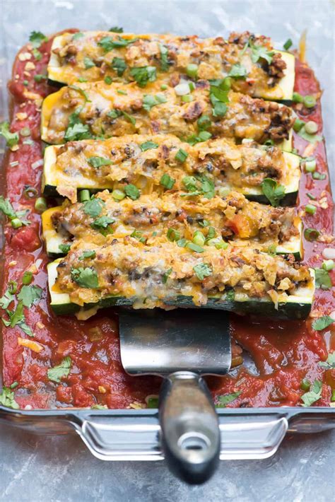 Taco stuffed zucchini boats have all the taco flavors stuffed into a zucchini. Taco Stuffed Zucchini Boats | Valerie's Kitchen
