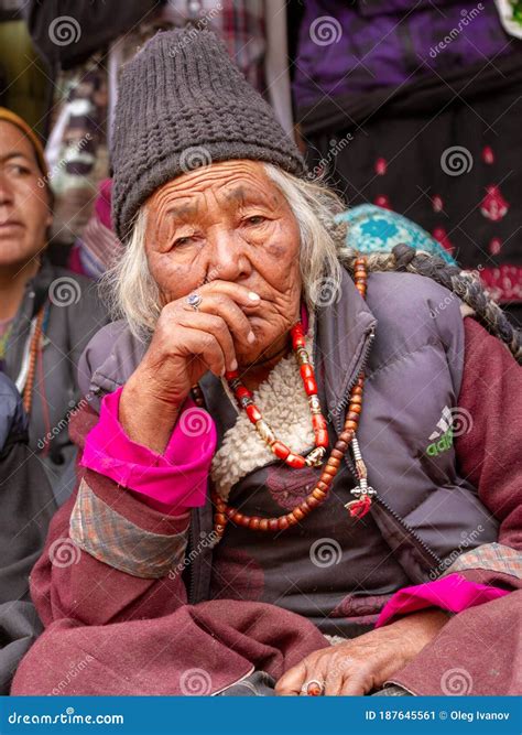Older Ladakhi Women With Hand Prayer Wheels In Traditional Clothes On