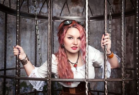 Beautiful Steampunk Woman In The Cage Stock Photo Image Of Grate
