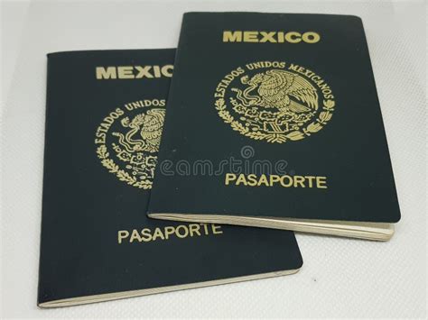 Two Mexican Passports In A White Background Stock Photo Image Of
