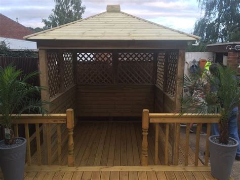 A leading garden buildings company we sell quality log cabins climbing. Gazebo Hot Tub Shelter Wooden Seating Area Garden Bar Wood ...