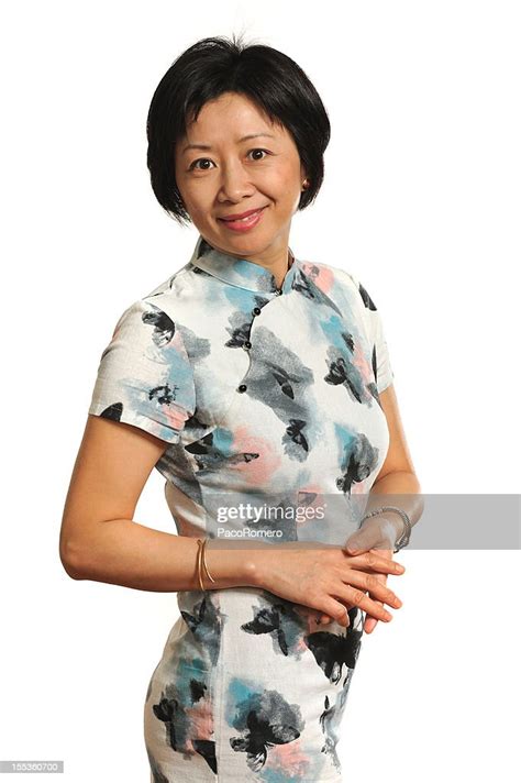 Attractive Mature Asian Woman Wearing Traditional Dress High Res Stock
