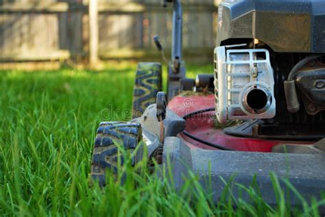 Ground Level View Of A Lawnmower In Tall Grass Stock Photo Image Of