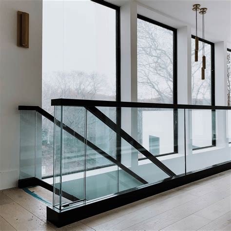 Glass Railing For A Modern Residential Space Concrete Interiors Living Room Design Styles