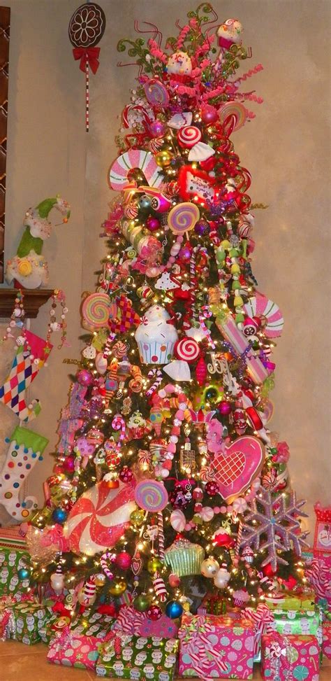 Put a christmas tree at a corner of the room wrapped in red and white ribbon and lights of red and white colors attached to it that makes it look like a big candy. #christmastree #christmas #candychristmas | Christmas tree ...