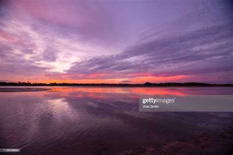 Vibrant Colored Sunrise Over The Ocean High Res Stock Photo Getty Images