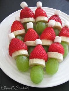 I like to use a star cookie cutter to cut the melon for festive flare! Fruit Santa Hat Treats. | Christmas food, Christmas snacks ...
