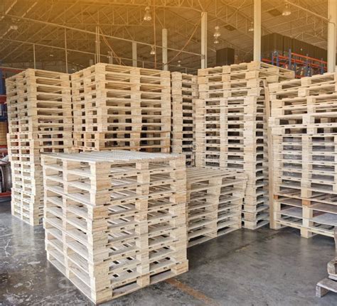 Wooden Pallets Stack At The Freight Cargo Warehouse For Transportation