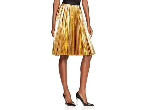 Splurge Jazmine Sullivans Bally Performance Dkny Gold Pleated Skirt