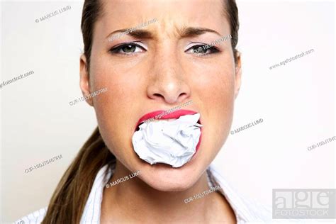Woman With Paper Ball Stuffed Into Her Mouth Stock Photo Picture And