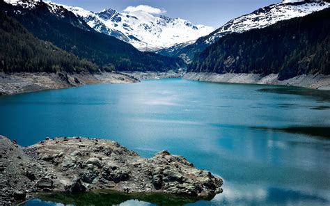 1680x1050 1680x1050 Mountains Lake Blue Water Source Wallpaper 
