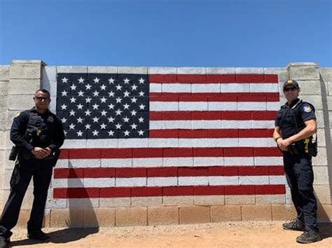 Police Restore Defaced 911 American Flag