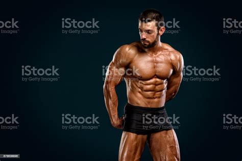 Muscular Men Flexing Muscles Stock Photo Download Image Now
