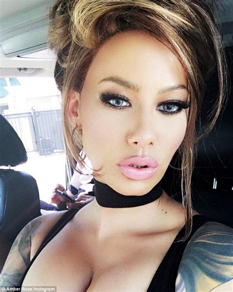 Amber Rose Looks Unrecognisable As She Flaunts Her Acres Of Cleavage At