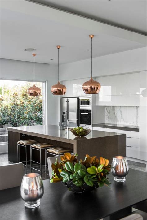 Pendants can be used in lieu of chandeliers for creative design schemes, displayed individually or paired in groupings over kitchen islands, dining room tables and in foyers. Brisbane based interior designers and decorators | Rose ...