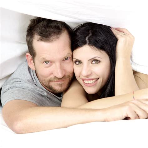 Happy Couple In Love Smiling In Bed — Stock Photo © Fabianaponzi 50141779