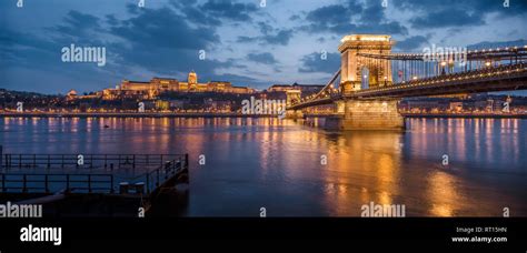 The Széchenyi Chain Bridge And The Danube River With The Castle Hill In