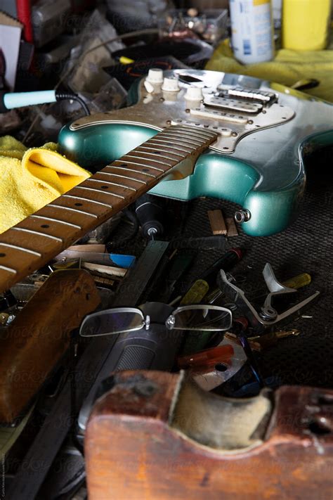 Guitar On Work Bench Del Colaborador De Stocksy Curtis Kim Stocksy