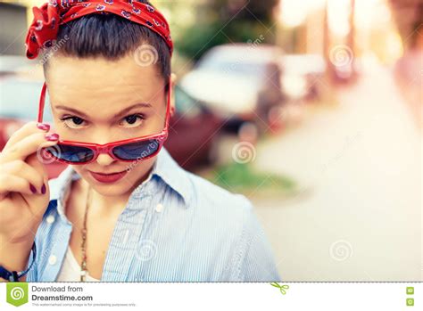 Hipster Girl Wearing Sunglasses And Fashion Accessories Smiling Girl Making Funny Faces In