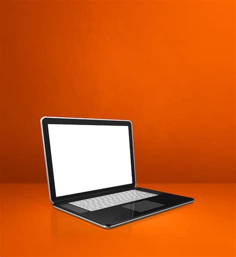 Premium Photo Laptop Computer On Orange Office Scene