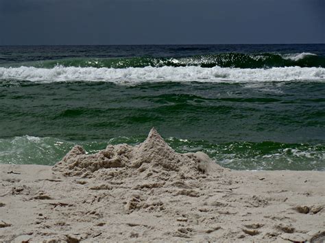 View Of A Sand Castle A Day After The Wind And Rain Had Their Way With
