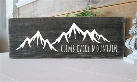 Climb every mountain, ford every stream, follow every rainbow, 'till you find your dream. Climb every mountain sign - Wood Ideas