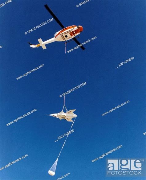 A Bell Uh 1 Helicopter Lifts The X 36 Tailless Fighter Agility Research
