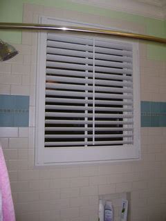 We used a narrow marble sill on the bottom lip. Waterproof Window Treatment for Wood Window in Shower?