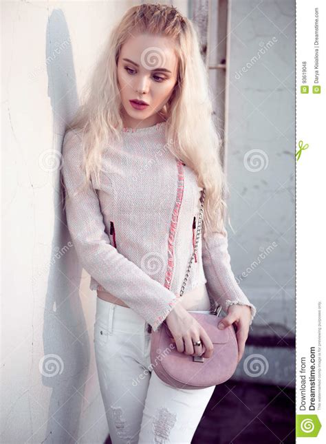 Outdoor Portrait Of Young Beautiful Happy Blond European Lady Posing On Street Model Wearing