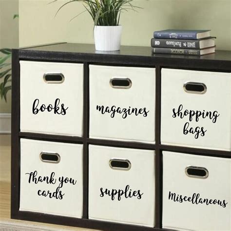 The Drawers Are Labeled With Books Magazines And Other Things In